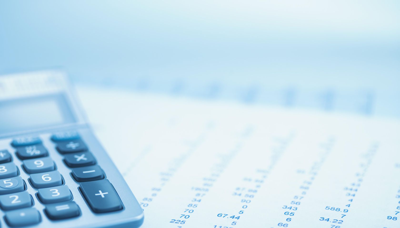 Close up of calculator and data