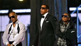 Jay Z performs with Lil Wayne and T.I at the Grammy Awards
