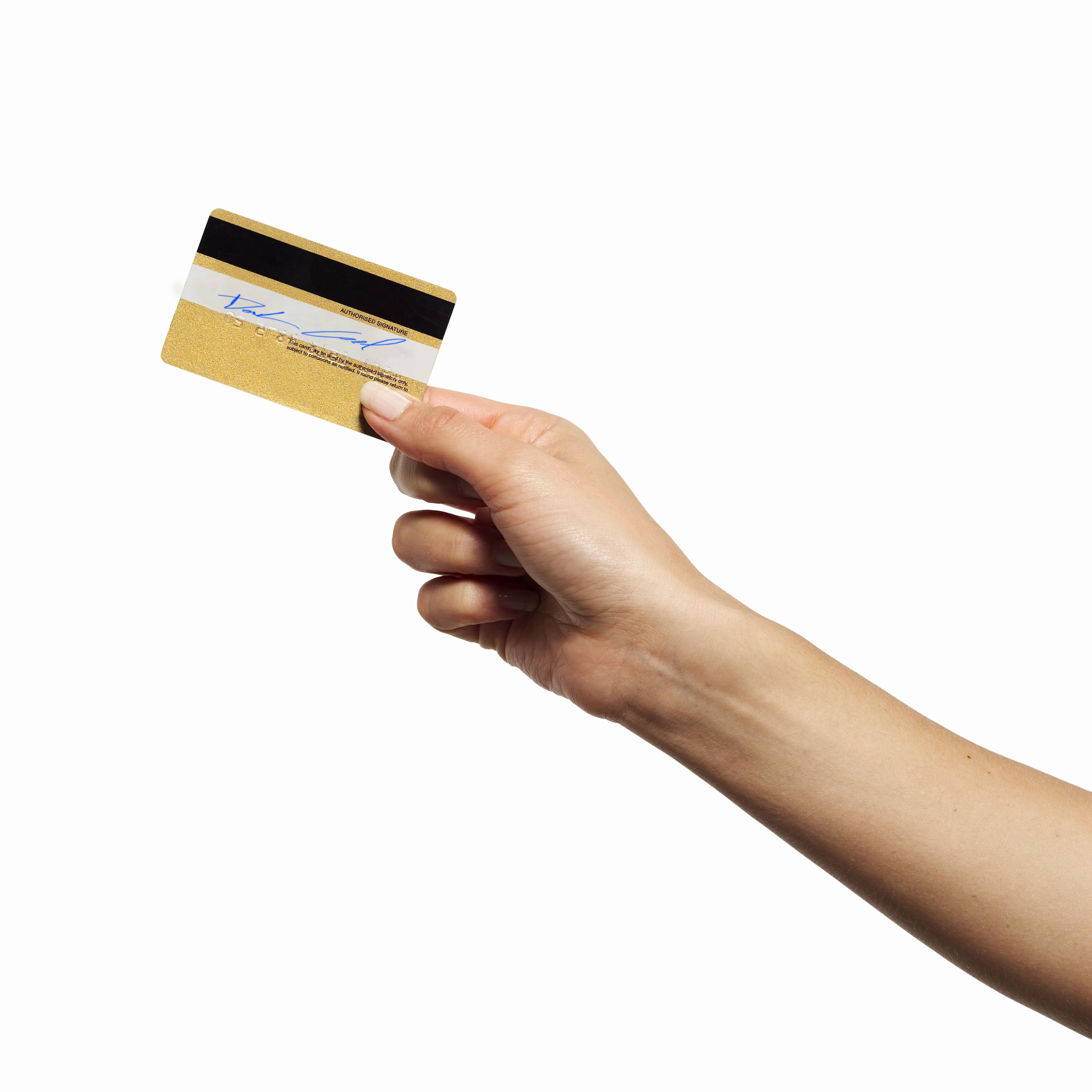 Close-up of woman's hand holding credit card