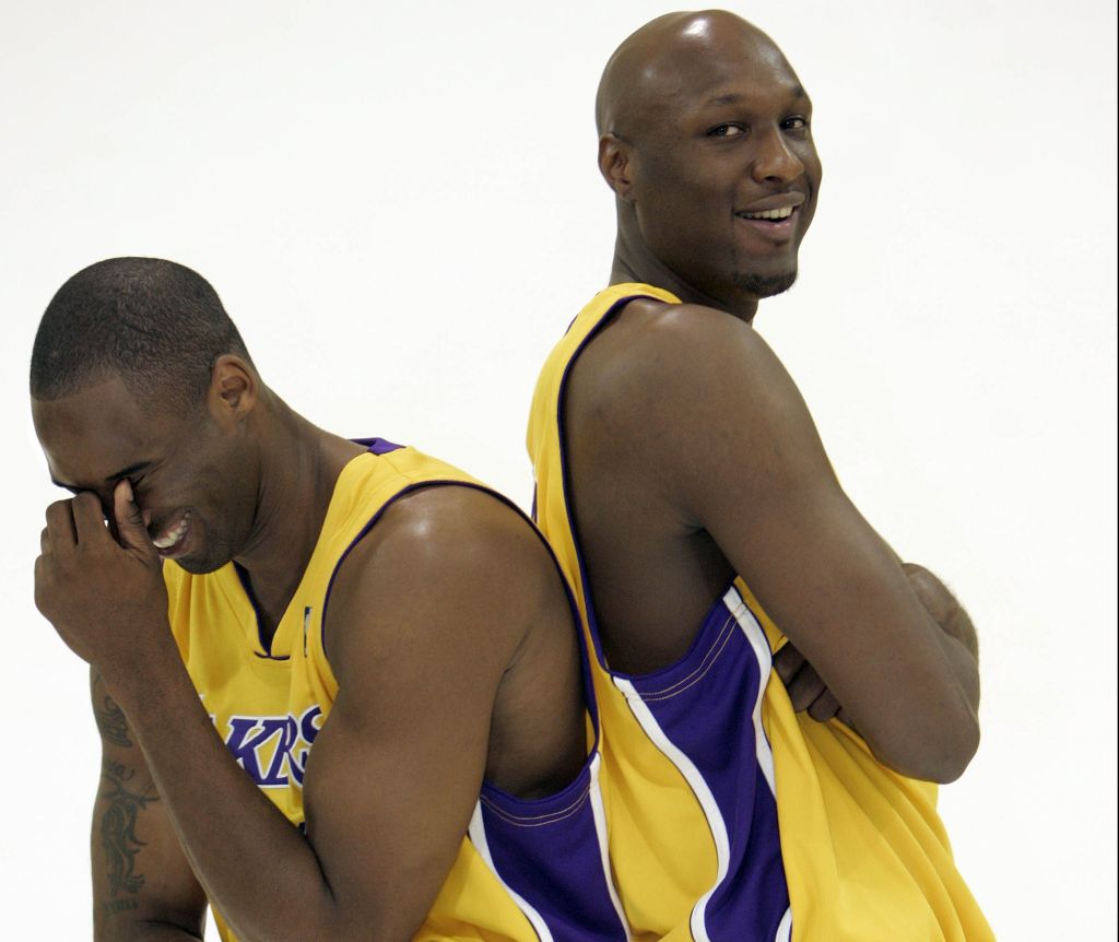 Kobe Bryant, left, and Lamar Odom of the Los Angeles Lakers share a laugh together in between being