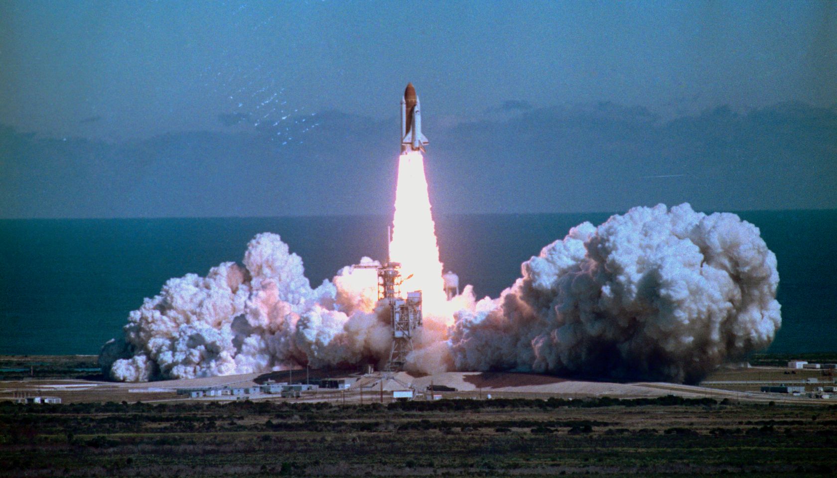 Space Shuttle Challenger Blasting off into Sky