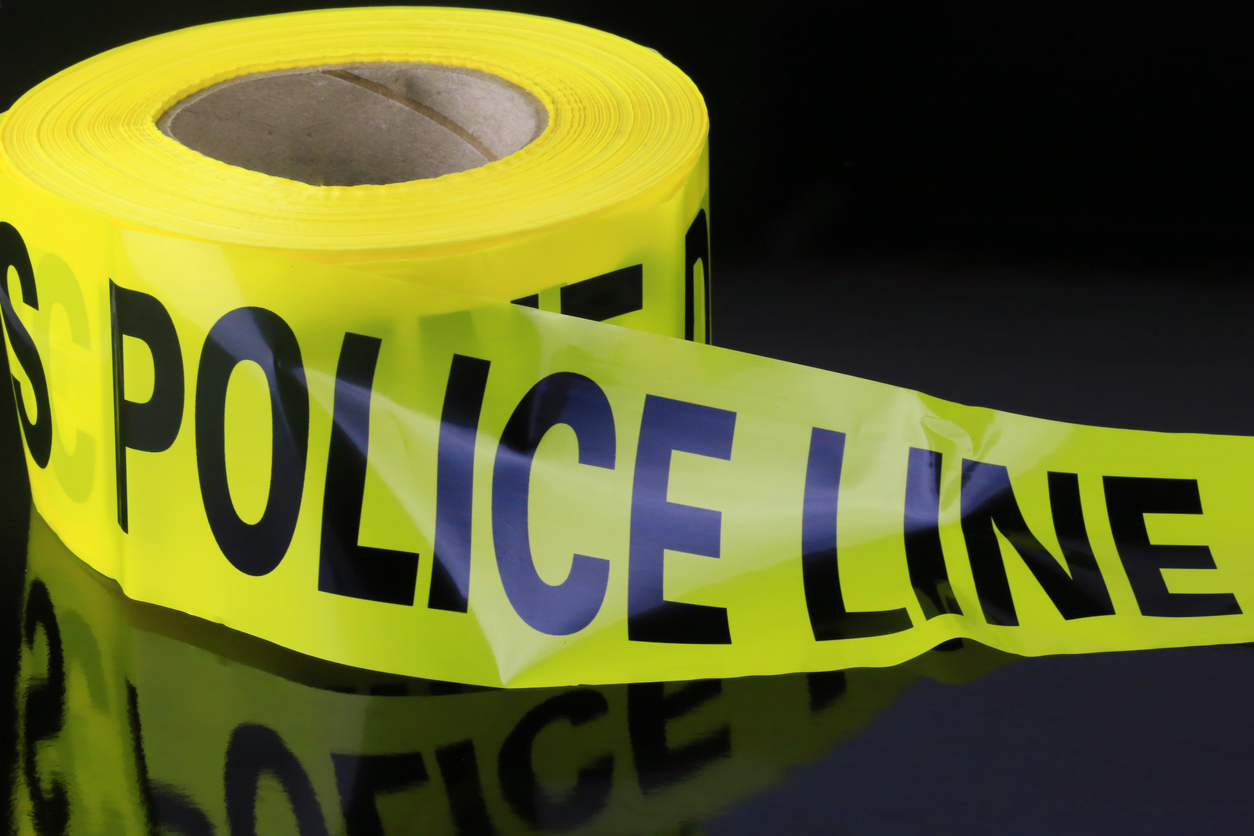 Roll of yellow police caution Tape