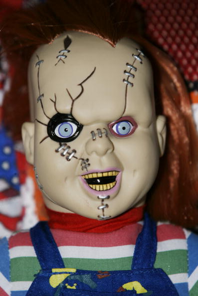 A fan displays a Chucky doll