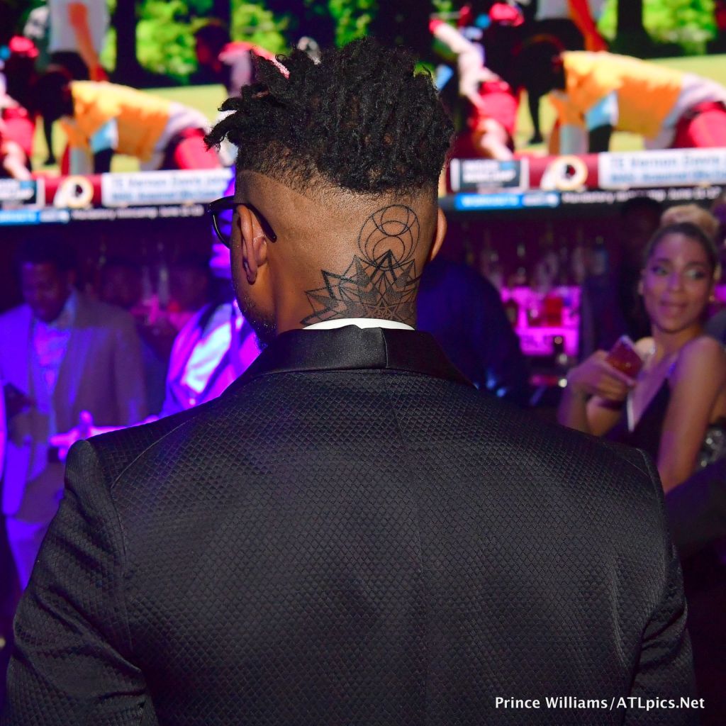 Usher shows new neck tattoo at Party For Usher producer Keith Thomas