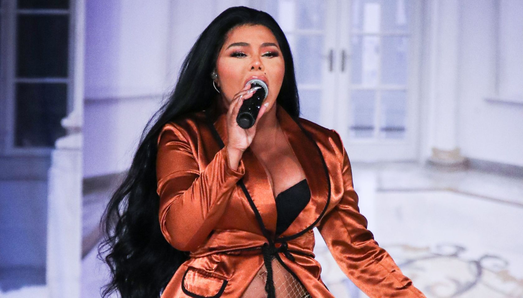 Rapper Lil' Kim performs onstage at the PrettyLittleThing x Saweetie runway show during New York Fashion Week: The Shows held at The Plaza Hotel on September 8, 2019 in Manhattan, New York City, New York, United States.