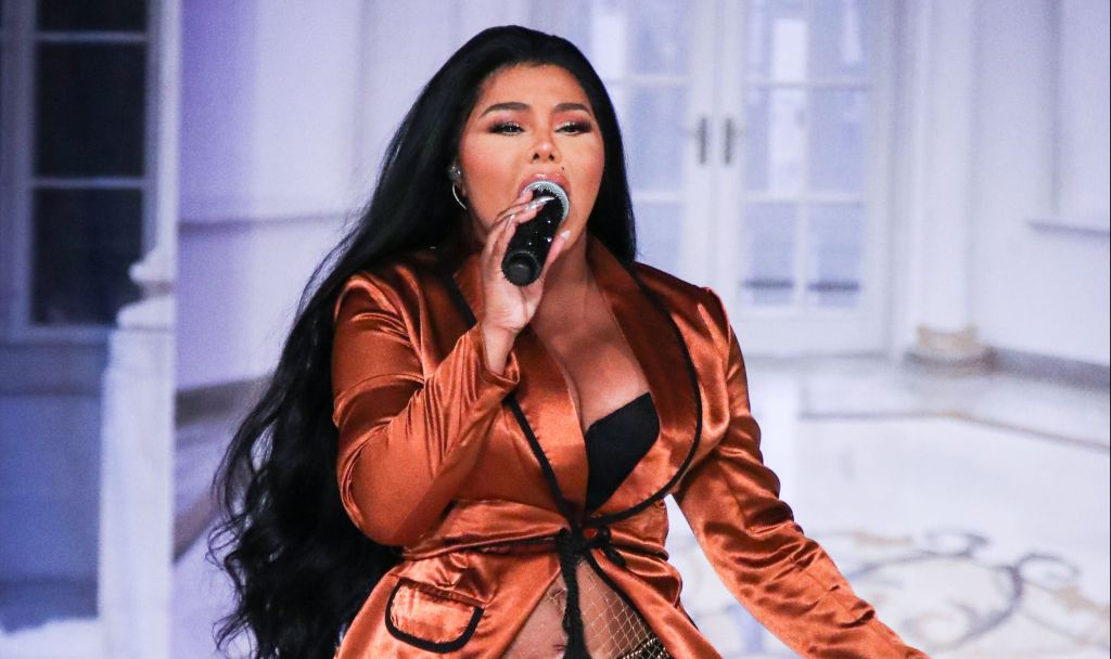 Rapper Lil' Kim performs onstage at the PrettyLittleThing x Saweetie runway show during New York Fashion Week: The Shows held at The Plaza Hotel on September 8, 2019 in Manhattan, New York City, New York, United States.