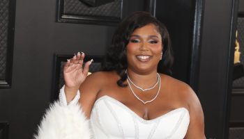 Singer Lizzo wearing an Atelier Versace dress, Rene Caovilla shoes and Lorraine Schwartz jewelry arrives at the 62nd Annual GRAMMY Awards held at Staples Center on January 26, 2020 in Los Angeles, California, United States.