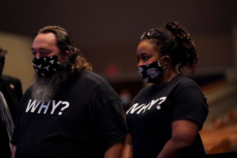 Mourners At The Casket