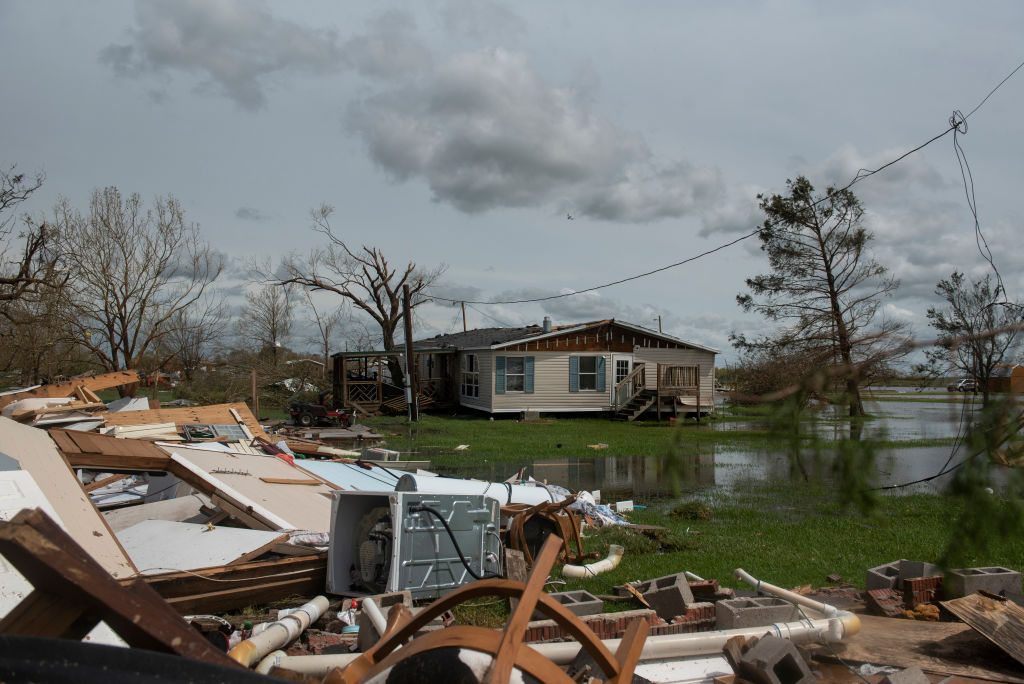 People Survey The Damage Caused By Hurricane Laura