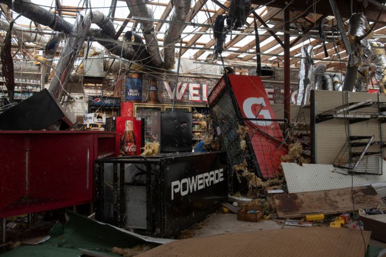 People Survey The Damage Caused By Hurricane Laura