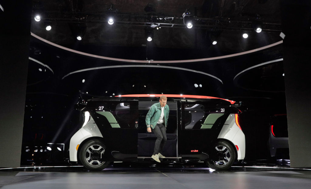 Kyle Vogt, steps out of the new Cruise Origin, at the unveiling of the new, fully autonomous passenger vehicle in San Francisco, Calif., on Tuesday, January 21, 2020