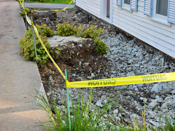 Caution Tape Around House Front