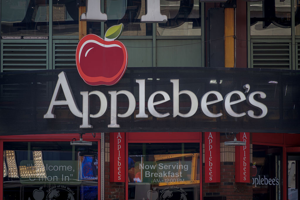 Sign at the entrance to an Applebee's in Midtown Manhattan...