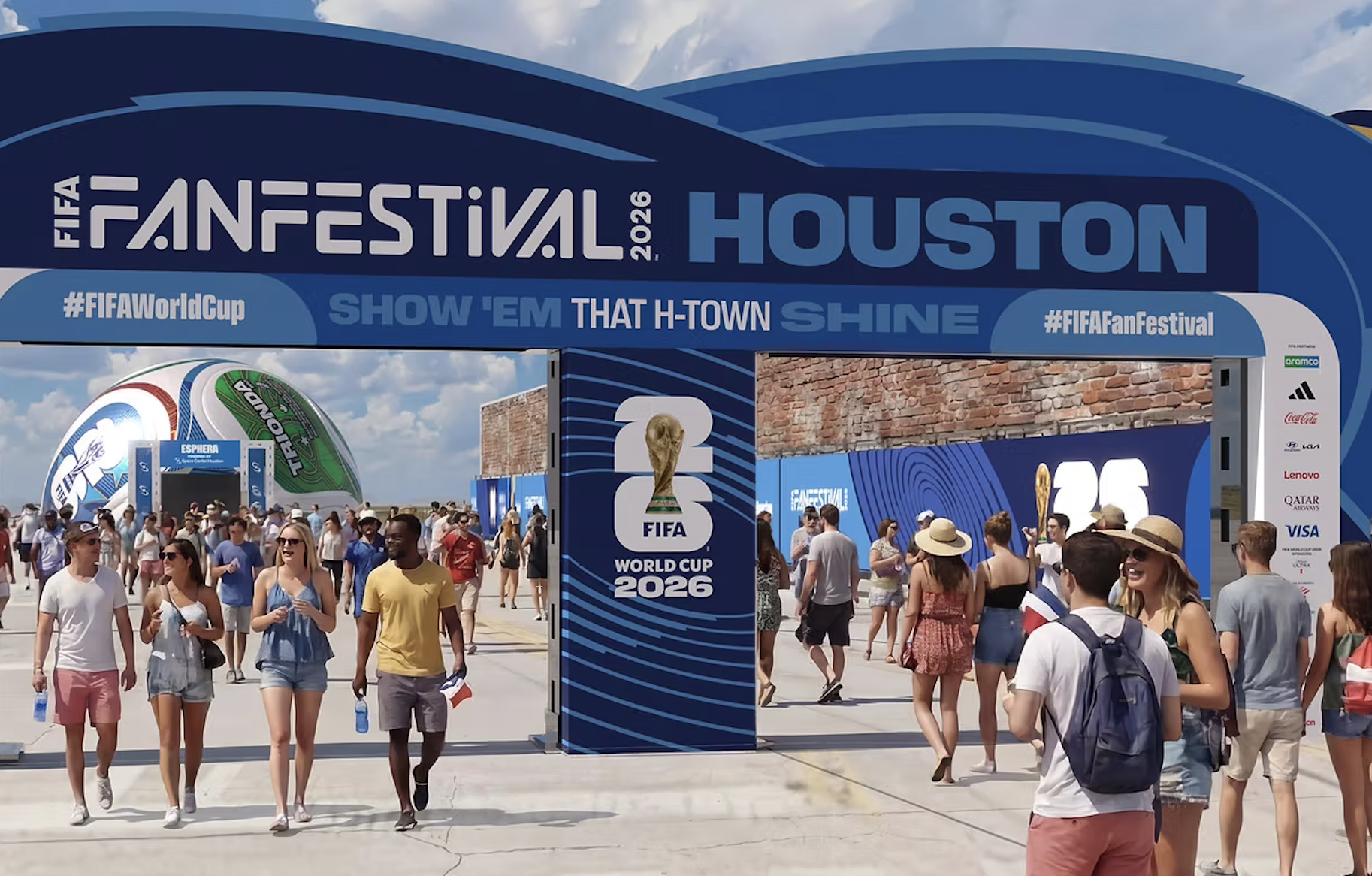 Crowds of people at the FIFA Fan Festival in Houston, with the FIFA World Cup 2026 logo and "Show 'em that H-Town shine" text prominently displayed.
