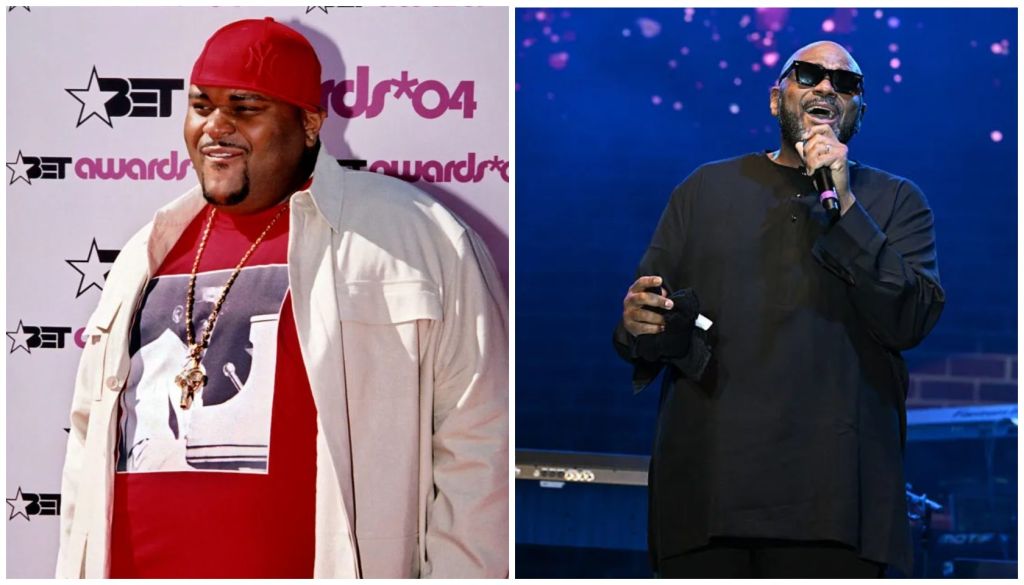A man wearing a red cap and white jacket stands on a red carpet at an awards show. Another man in a black coat performs on stage under colorful lights.