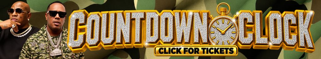 Two men wearing sunglasses and jewelry standing in front of a large "Countdown Clock" sign with the text "Click for Tickets".